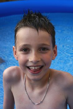 Portrait of boy in water.