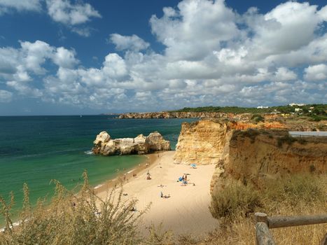 A section of the idyllic Praia de Rocha beach on the southern coast of the Portuguese Algarve region.