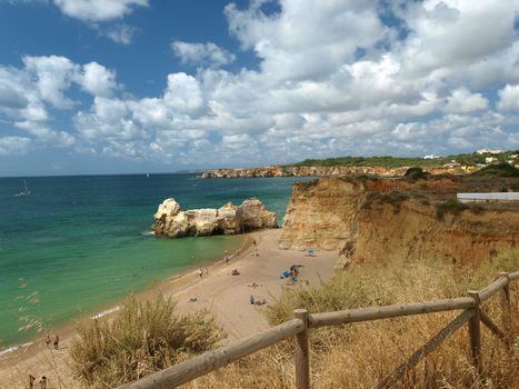 A section of the idyllic Praia de Rocha beach on the southern coast of the Portuguese Algarve region.