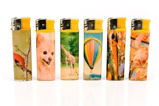 Lighters with pictures of animals isolated on white