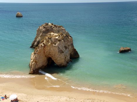 A lonely rock in the ocean. The effect of erosion