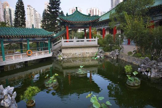 Red Pavilion Good Fortune Garden Pond Reflection Wong Tai Sin Taoist Temple Kowloon Hong Kong China