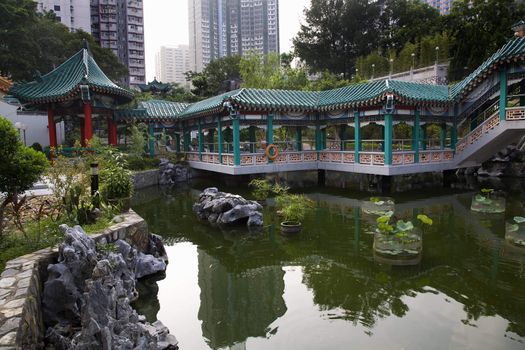 Chinese Good Fortune Water Garden Modern Buildings Wong Tai Sin Taoist Temple Kowloon Hong Kong Surrounded by Modern Apartment Buildings