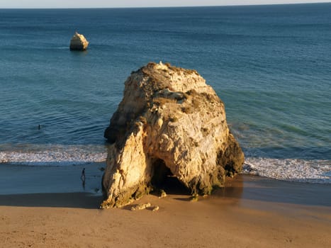 A lonely rock in the ocean. The effect of erosion
