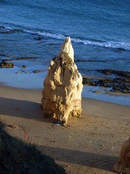 A lonely rock in the ocean. The effect of erosion