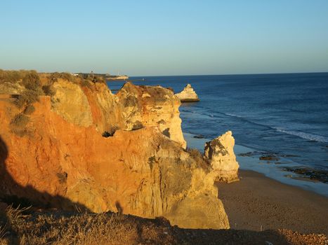 Praia da Rocha in the glow of the sunset. Portimao, Algarve