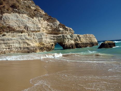 A section of the idyllic Praia de Rocha beach on the southern coast of the Portuguese Algarve region.
