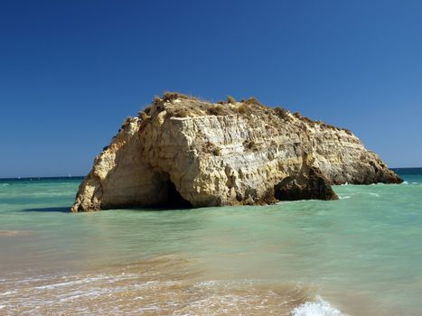 A section of the idyllic Praia de Rocha beach on the southern coast of the Portuguese Algarve region.