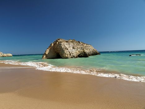 A section of the idyllic Praia de Rocha beach on the southern coast of the Portuguese Algarve region.