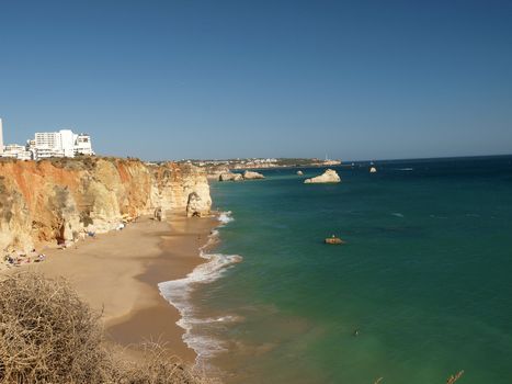 A section of the idyllic Praia de Rocha beach on the southern coast of the Portuguese Algarve region.