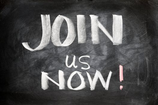 Join us now written on a blackboard