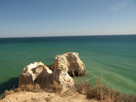 A lonely rock in the ocean. The effect of erosion