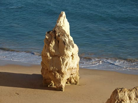 A lonely rock in the ocean. The effect of erosion