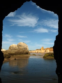 Caves and colourful rock formations on the Algarve coast in Portugal