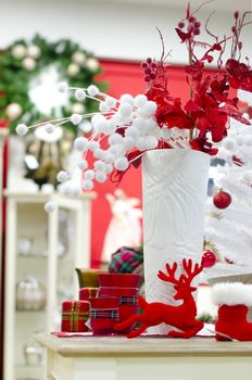 christmas and new year white vase and red elements decoration