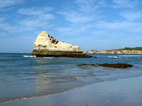 A lonely rock in the ocean. The effect of erosion