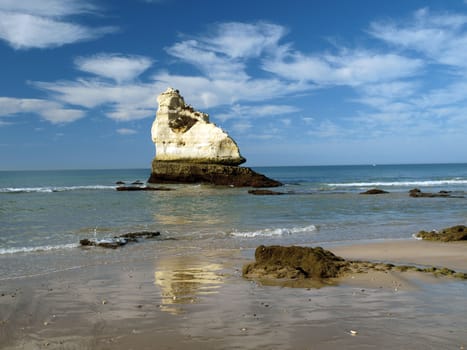 A lonely rock in the ocean. The effect of erosion