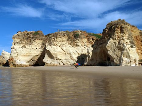 Caves and colourful rock formations on the Algarve coast in Portugal 