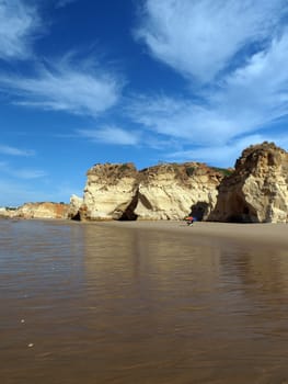 Caves and colourful rock formations on the Algarve coast in Portugal 