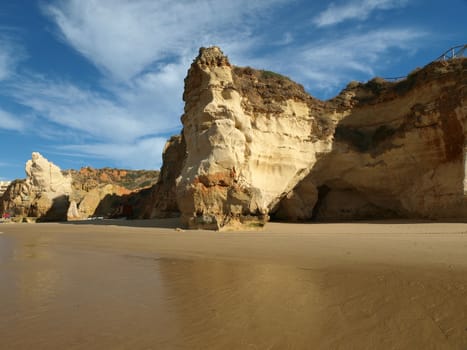 Caves and colourful rock formations on the Algarve coast in Portugal 