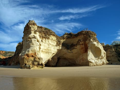 Caves and colourful rock formations on the Algarve coast in Portugal 