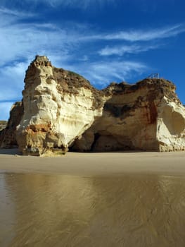 Caves and colourful rock formations on the Algarve coast in Portugal 