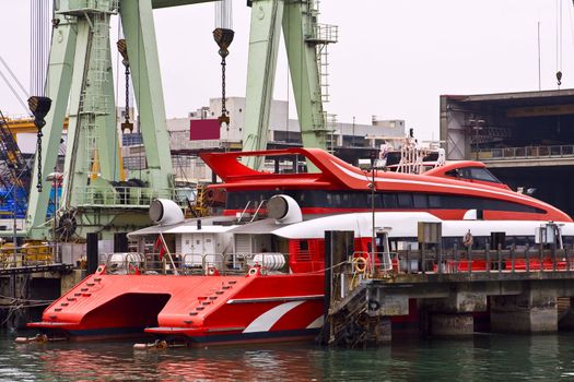 Catamaran ferry in maintain harbor