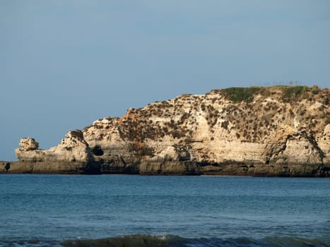 Caves and colourful rock formations on the Algarve coast in Portugal