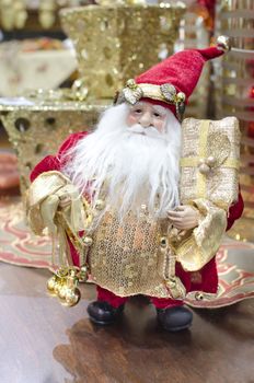 santa claus statue decoration posing with new year souvenir