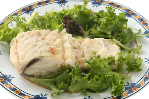 Boiled codfish with salad