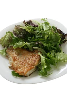 Fried fish with salad