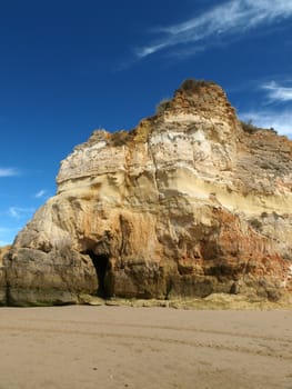 Caves and colourful rock formations on the Algarve coast in Portugal