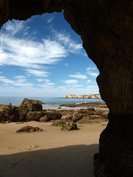 Caves and colourful rock formations on the Algarve coast in Portugal