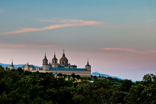 San Lorenzo de El Escorial Monastery from a distance with beautiful sky right after sunset.