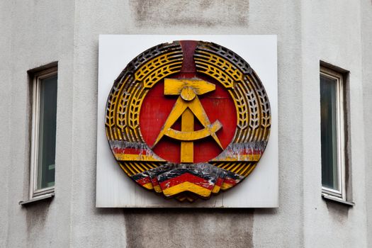This symbol of the German communist party is displayed near the Checkpoint Charlie at the Berlin Wall.