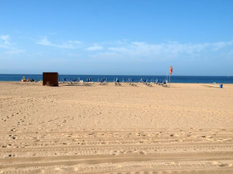 A section of the idyllic Praia de Rocha beach on the southern coast of the Portuguese Algarve region.