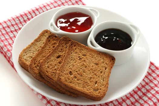 toasts with jam in bowls