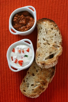 toasts with dip in bowls