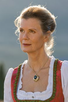 Old Bavarian woman in fashionable festive costume