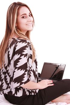 Portrait of beautiful woman using laptop while looking at you