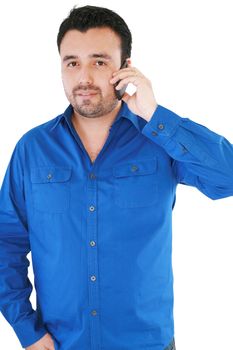 young casual man talking on the phone isolated on white background