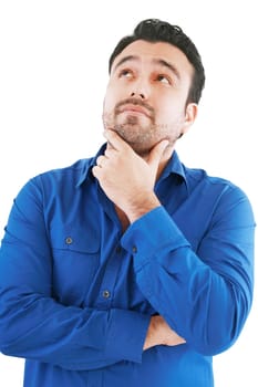 Young man in thoughtful pose. Isolated over white.