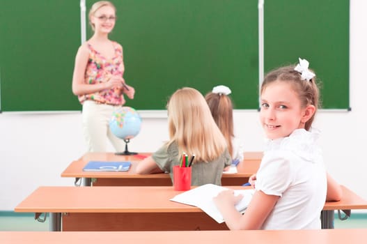 portrait of the girl in the class, the teacher tells the next school board