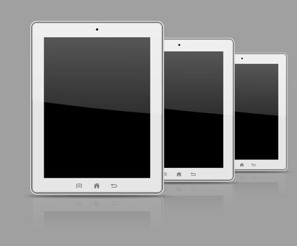 Three modern personal electronic white tablets