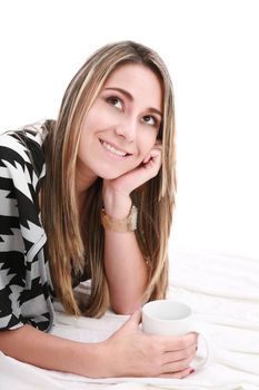 Smiling woman laying on bed