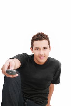 Teenage boy with TV remote control