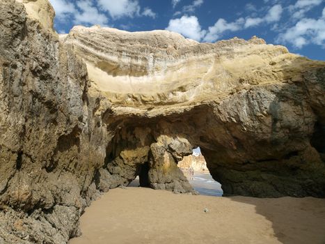 Caves and colourful rock formations on the Algarve coast in Portugal