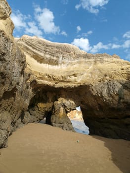 Caves and colourful rock formations on the Algarve coast in Portugal