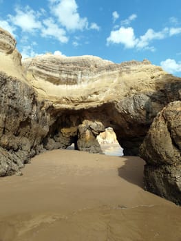 Caves and colourful rock formations on the Algarve coast in Portugal