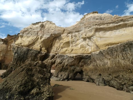 Caves and colourful rock formations on the Algarve coast in Portugal